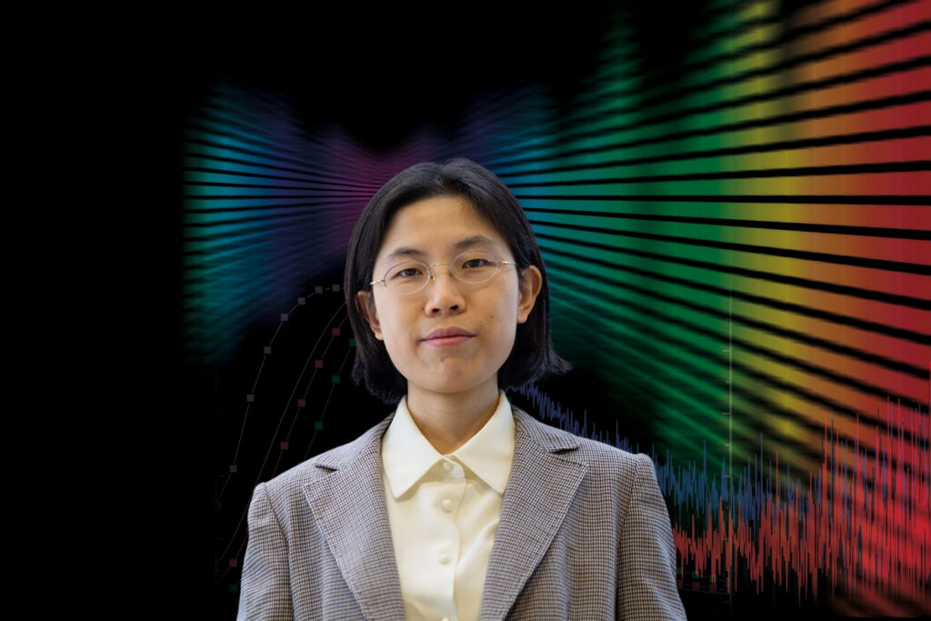 Shengxi Huang presenting research on van der Waals materials and quantum optical emission using time-resolved photoluminescence and spectroscopy.